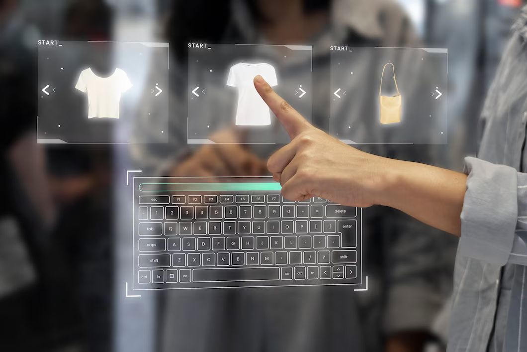 A transparent touchscreen displaying clothing options and a virtual keyboard in a modern retail setting.