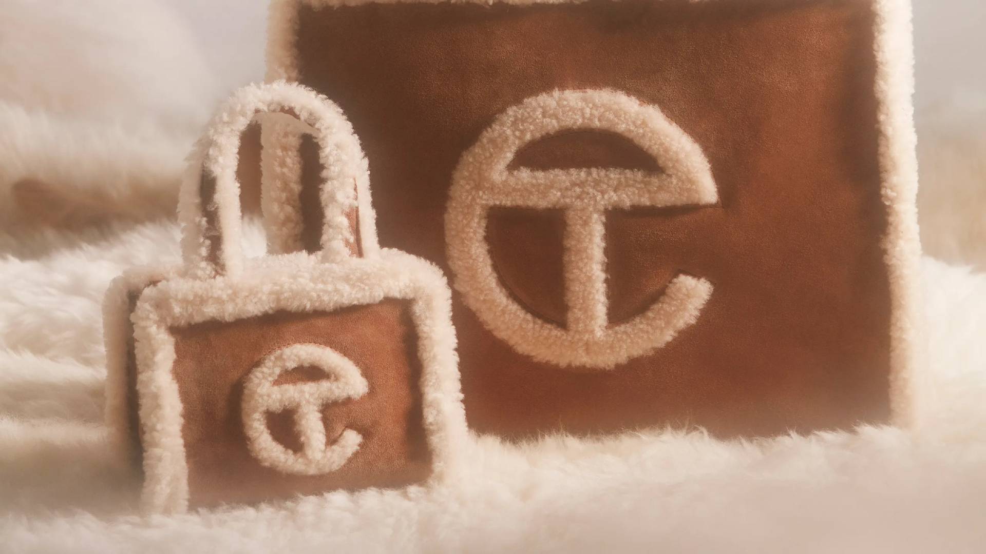 Two fluffy, brown items decorated with white trim and stylized